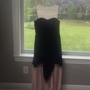 Black and pink long pleaded dress.